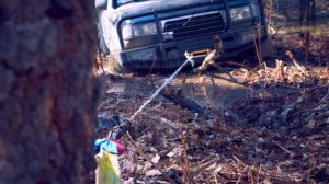 Overland Rig Winching out of a puddle